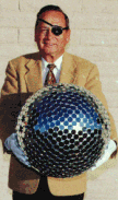 Man holding Starshine Disco Ball Satellite