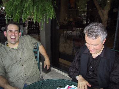 Pat and Leo on the Patio - Leo's looking at pictures